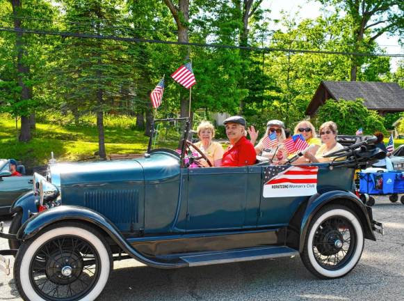 Members of the Hopatcong Woman’s Club ride in the parade.