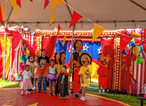 <b>Children wear costumes to take part in ‘Giovanni Anastasini Presents: Join the Circus.’ (Photo by Nancy Madacsi)</b>