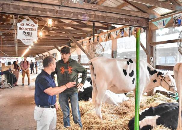 <b>Rep. Josh Gottheimer tours the livestock area. (Photo provided)</b>