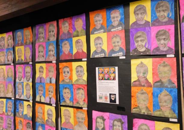 Andy Warhol's signature style is on display in these self-portraits done by the Pre-K class at Our Savior Nursery School in Stanhope, exhibited here at the school's art gala on Thursday, Feb 27, 2020. 3- Artwork inspired by the storybook Mix It Up lines the aisle of the Lutheran Church of Our Savior during the Our Savior Nursery School art gala on Thursday, Feb 27, 2020. This work was created by the school's 3s Class for the event.