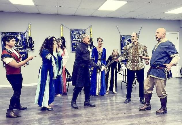 The newly formed Black Cat Theatre Company of New Jersey rehearses ‘Game of Abbeys,’ a spoof on the popular HBO show ‘Game of Thrones’ and PBS series ‘Downton Abbey.’ (Photo provided)