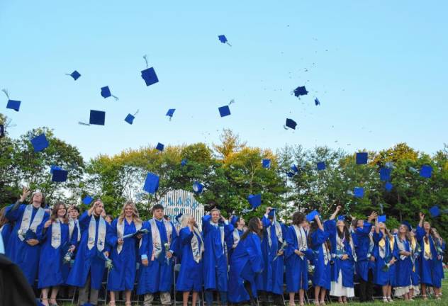 Members of the Kittatinny Regional High School Class of 2024 toss their caps in the air at the end of graduation. (Photo provided)