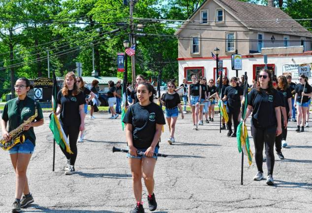 Band members march in the parade.