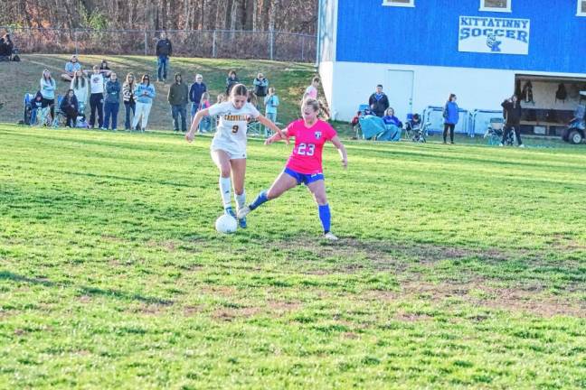 Cresskill's Ana Gonzalez Eusevi and Kittatinny's Reese Redden challenge each other for control of the ball.