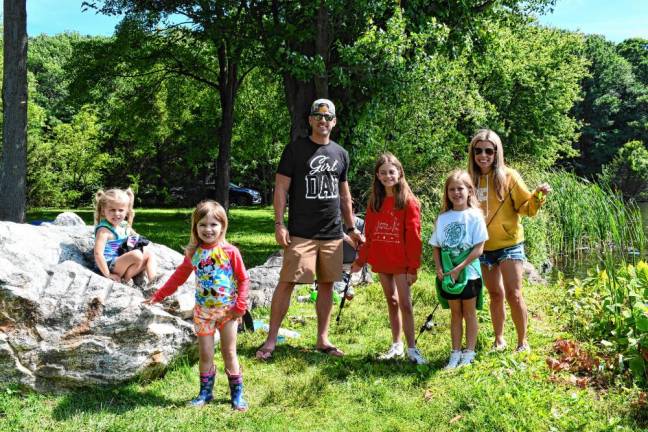 Grace Blough and Kelsey Knudsen with Jason, Joselyn, Lucy and Theresa Blough.