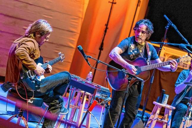 <b>John Oates, right, will sing and tell stories Thursday, Aug. 22 at the Newton Theatre. (Photo courtesy of John Oates)</b>