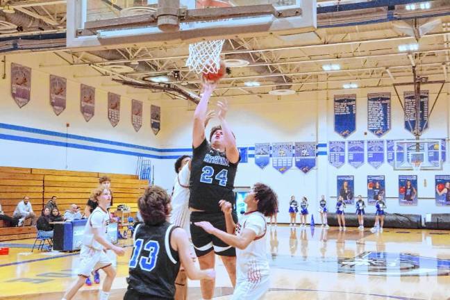 Kittatinny's Connor Logan attempts a shot in the game against Dover. He scored 25 points.