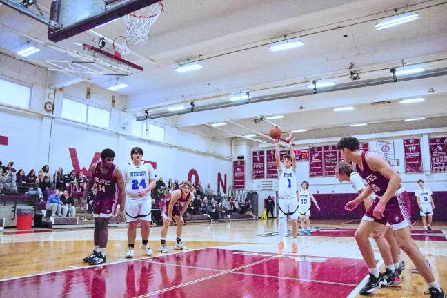 Kittatinny's Michael Strong releases the ball from the free throw line.