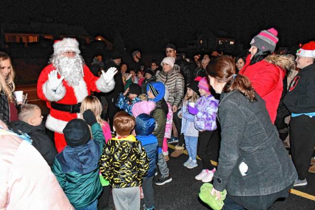 Santa greets the crowd Sunday, Dec. 1 outside the Cranberry Lake Firehouse in Byram. (Photos by Maria Kovic)