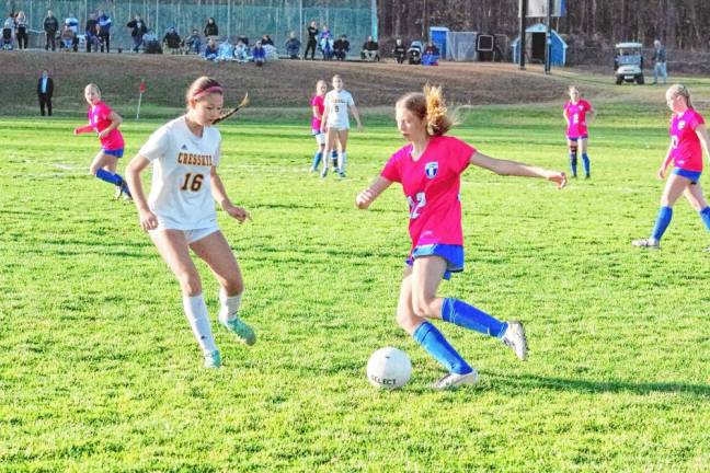 Kittatinny's Eleanor Deckert controls the ball as Cresskill's Ariel Alejo tries to keep pace in the semifinal round of the NJSIAA North Jersey, Section 1, Group 1 tournament Monday, Nov. 11. The Cougars won, 3-0, and Deckert scored one goal. (Photos by George Leroy Hunter)