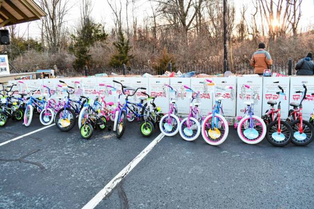 <b>New bikes and other donated toys are lined up to be loaded on the train. They will be distributed to underprivileged</b> children by the U.S. Marine Corps Reserve’s Toys for Tots Foundation. (Photo by Maria Kovic)