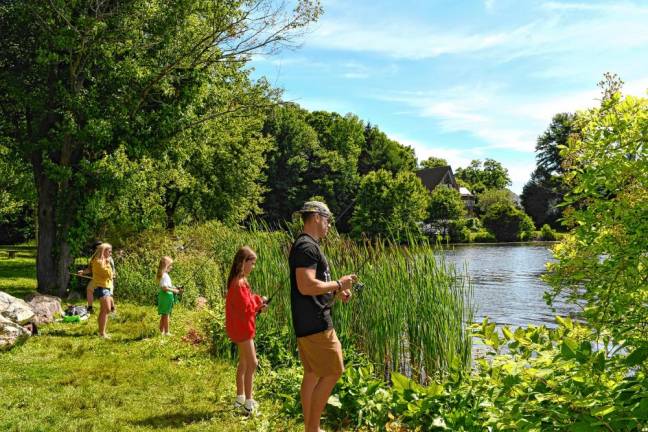 SF2 Jason Blough fishes with his daughters in the Child &amp; Dad Fishing Derby on Sunday, June 16 at Lake Musconetcong Park in Stanhope. (Photos by Maria Kovic)