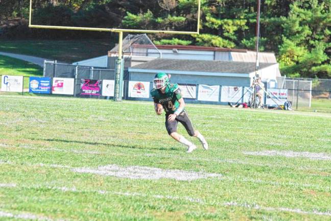 <b>Sussex Tech running back Brian Gruber rushed for 106 yards and scored one touchdown. (Photo by George Leroy Hunter)</b>