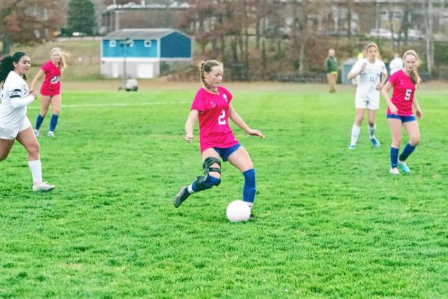 Kittatinny's Katie Sajdak is about to kick the ball.