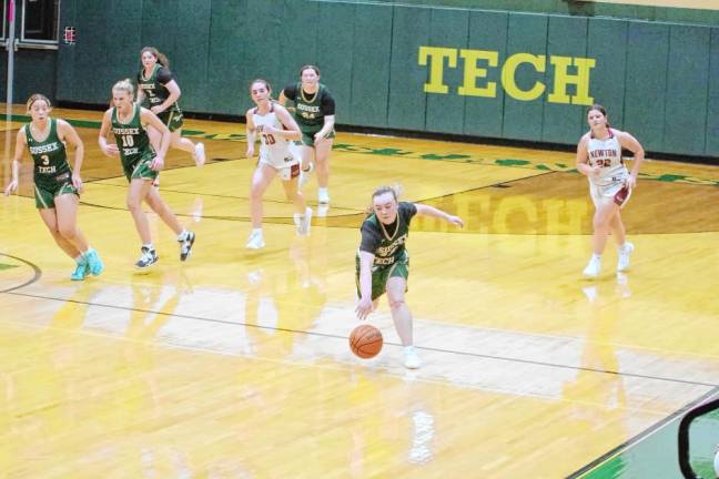 Sussex Tech's Emma Franchi dribbles the ball. She scored two points, grabbed three rebounds, made two assists and was credited with two steals.