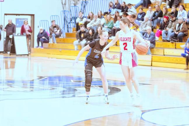 High Point’s Grace Elston handles the ball while covered by Kittatinny’s Katie Sajdak. Elston scored seven points.