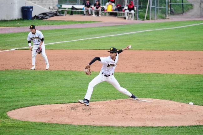 Sussex County Miners relief pitcher Bobby Curry prepares to pitch. He pitched for three innings and was credited with three strikeouts and allowing one run.