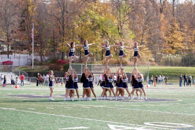 Pope John cheerleaders entertain the crowd during halftime.