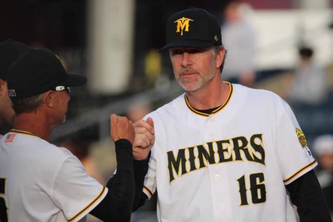 New manager Chris Widger is introduced before the game.