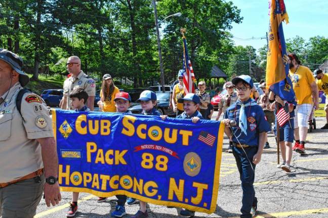 Cub Scouts march in the parade.