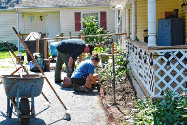 <b>The nonprofit organization invited volunteers to help out in exchange for a meal Friday, July 26. </b>