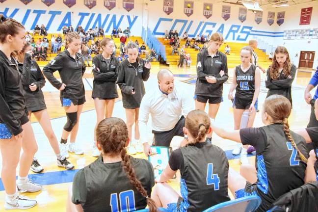 Kittatinny’s girls basketball head coach Joshua Reed instructs players during a break.