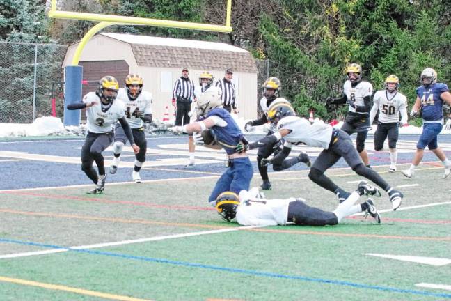 Pope John ball carrier Wes Johnston is stopped short of the goal line during a two-point conversion attempt in the first half of the NJSIAA Non-Public, Group B tournament semifinal Saturday, Nov. 23 in Sparta.