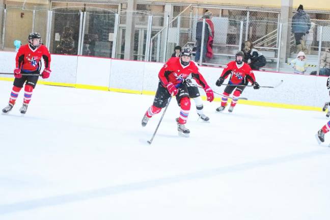 <b>High Point’s Bradyn Husarenko steers the puck.</b>