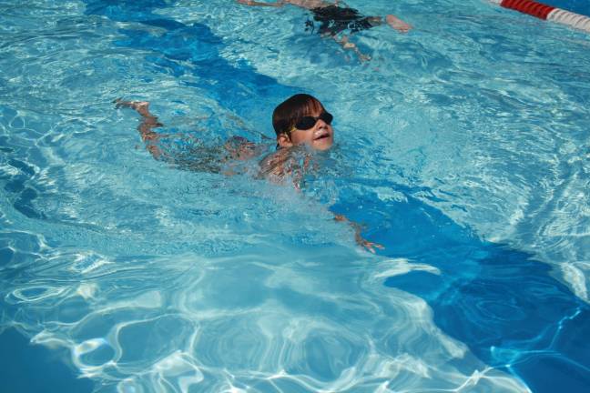 Photos by Rose Sgarlato Leo Biondo, age 5, goes for fifteen laps at Lake Mohawk Pool&#x2019;s swim-a-thon.