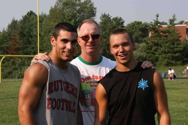 From left, former Hopatcong High School football star Joe Martinek visited his former track coach Mike Juskus and friend John Dominski.