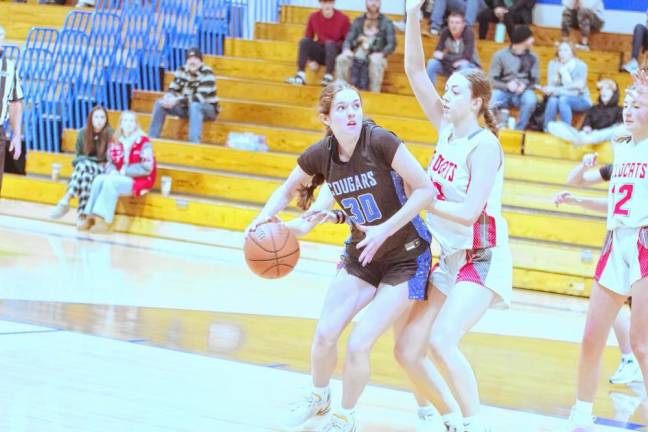 KT1 Kittatinny’s Lina Hull handles the ball in the game against High Point on Jan. 4. Kittatinny won, 37-29. (Photos by George Leroy Hunter)