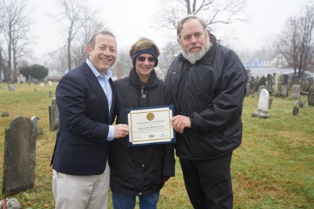 U.S. Rep. Josh Gottheimer (D-NJ5) presents Wendy Wyman and Wayne McCabe of the Sussex County Historical Society with a certificate of appreciation for the Wreaths Across America ceremony held at the Old Newton Burial Ground on Saturday, Dec 14, 2019.