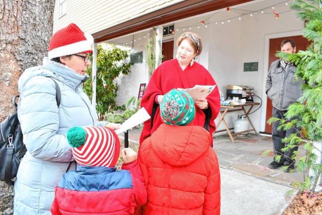 Homes and businesses along Main Street are decorated for the visitors.