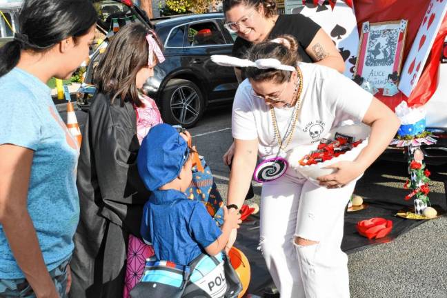 Children collect candy during the Trunk or Treat on Thursday, Oct. 31 in Newton. (Photos by Maria Kovic)