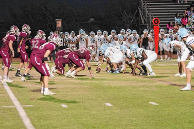 <b>The Newton Braves and the Sparta Spartans face each other on the field.</b>