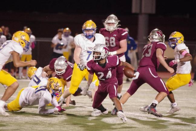 Newton running back DeMarius Posey (24) rushed for 136 yards and made one touchdown in the game against Lyndhurst. He also caught two interceptions. (Photos by George Leroy Hunter)