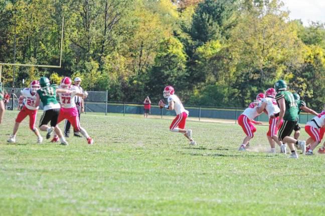 <b>LV2 Lenape Valley quarterback Tanner Gaboda is on the run with the ball in the second half of the game against Sussex Tech. He threw one touchdown pass. </b>