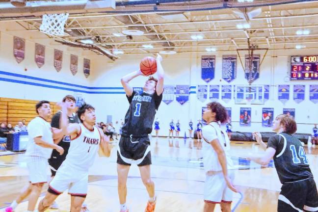 Kittatinny's Michael Strong leaps during a shot in the second quarter. He scored 31 points.