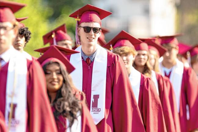 Members of the Newton High School Class of 2024 file into graduation Monday, June 17. (Photos by Charlie Neely Photography)