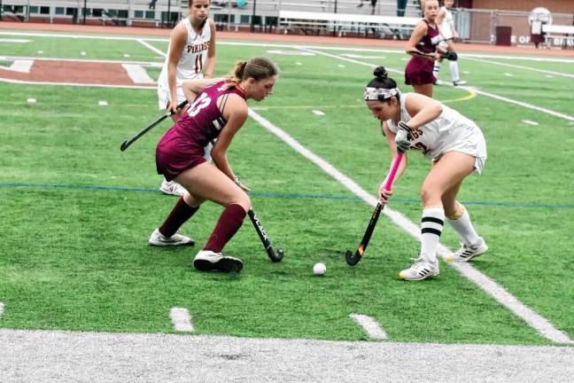 Newton's Meadow D'Annibale and Voorhees's Isabella Settembrini battle for control of the ball in the third period.