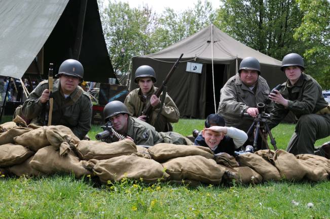 Robert Misskerg gives re-enacting a try with the members of the Vernon-based 94th Infantry