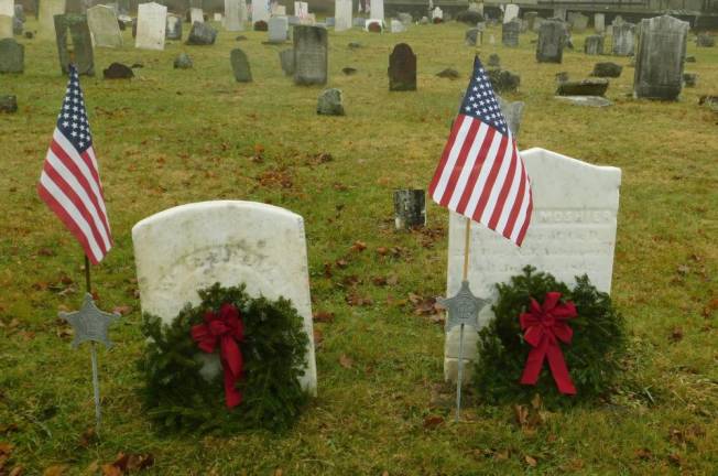 Wreaths adorn the graves of two Civil War veterans at the Old Newton Burial Ground on Saturday, Dec 14, 2019, after a Wreaths Across America ceremony was held at the historic cemetery.