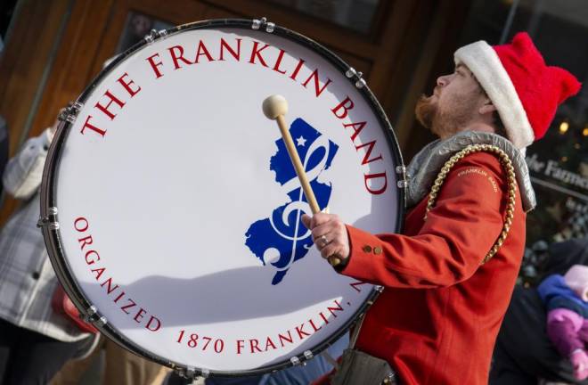 Andrew Kosco of the Franklin Band performs in the parade.