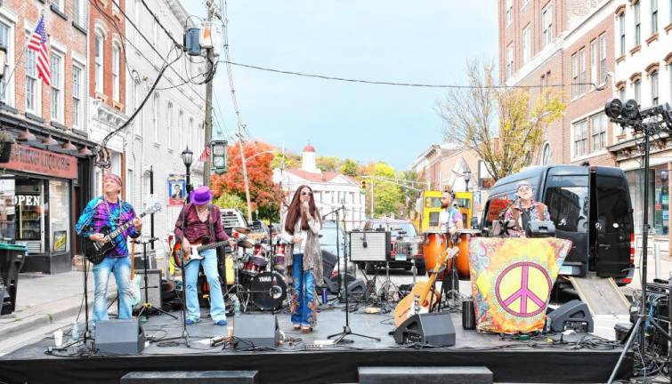 Musicians perform during the annual Fall Festival on Spring Street in Newton on Sunday, Oct. 13.