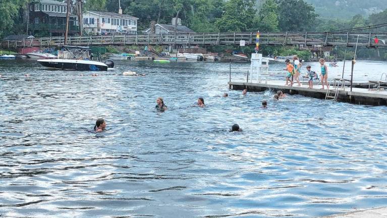 ‘Tangled’ cast members move into the water.