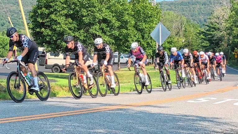 The Men 123 category was won by Adem Aricanli of Bow, N.H., part of the Jamison Racing group. He finished the 57-mile race in two hours 10 minutes and 35 seconds.