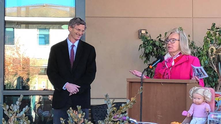 Deborah Berry-Toon, executive director of the Project Self-Sufficiency, thanks Jon Connolly, president of Sussex County Community College, for the college’s support of the Season of Hope toy drive.