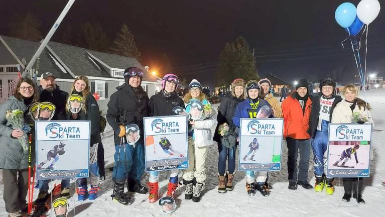 Racers and parents on Senior Night, Feb. 2 (from left): Kristi, Robert and Emma Dyrsten; Brendian, Cora and Jenny Moriarty; Missy, Rachel and Josh Reder; Alfred, Devon and Candace Scott (Photo by Therese Calafati)