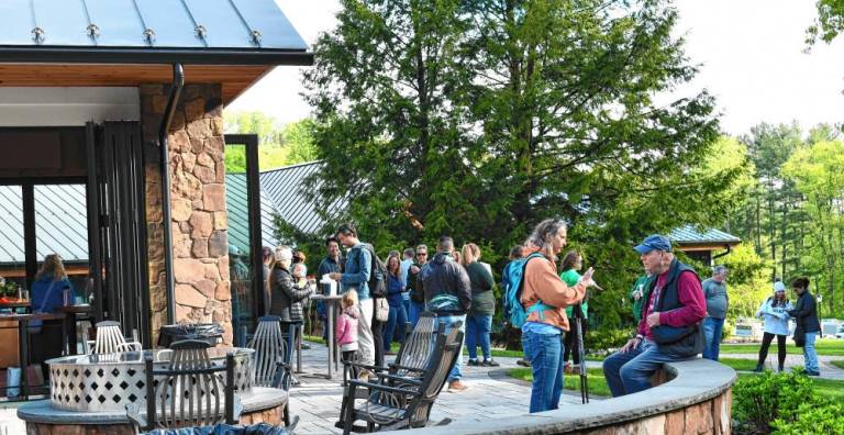 People gather at the Crow’s Nest at Hudson Farm for the charity hike, sponsored by the Hudson Farm Club.