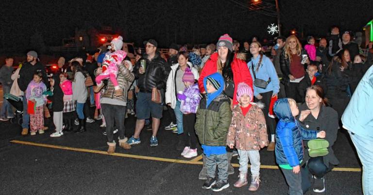 The crowd awaits Santa’s arrival.